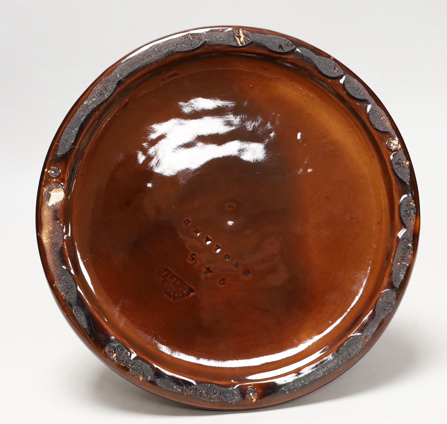 A Bretby ewer in the style of Christopher Dresser, base to top of handle, 31cm high